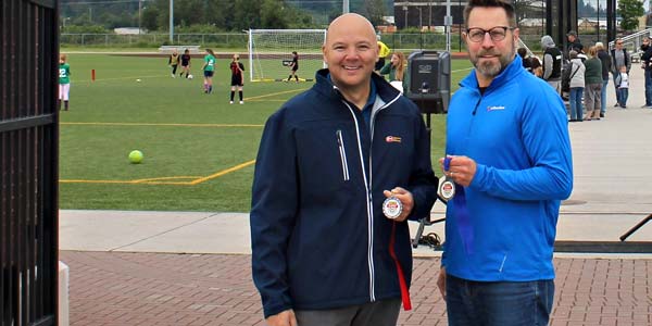 Les Schwab and Willamane Park employees showing off medals.