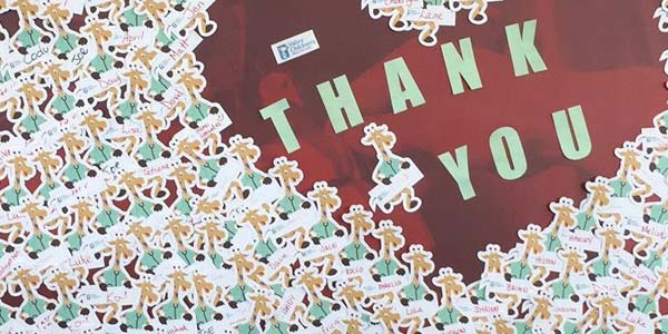 A Thank You poster at Valley Children’s Hospital covered in lots of doctor giraffe stickers.