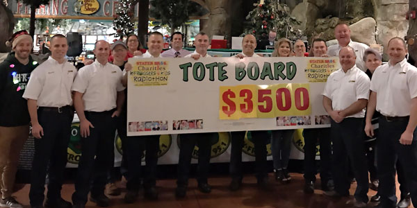 Les Schwab managers pose with Second Harvest Volunteers.